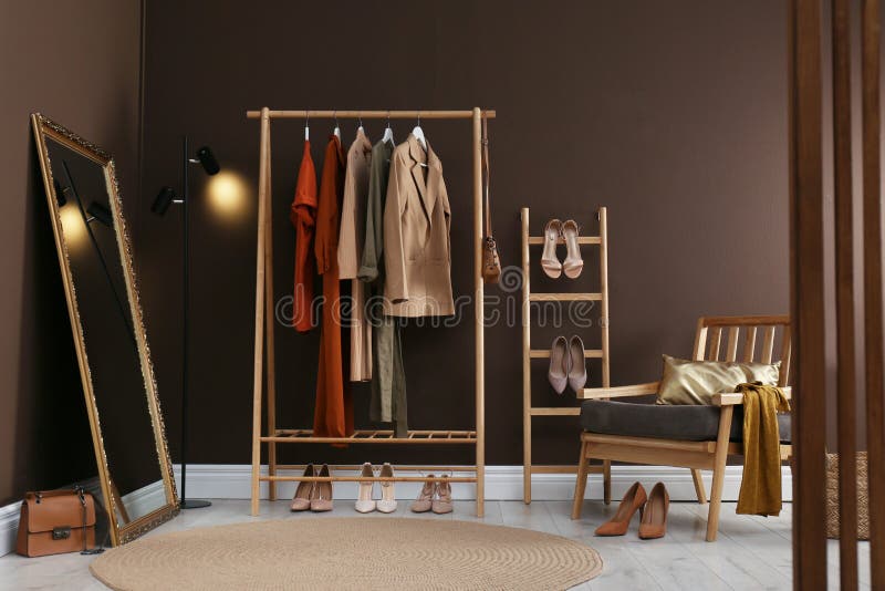 Modern Dressing Room Interior with Clothing Rack, Mirror and