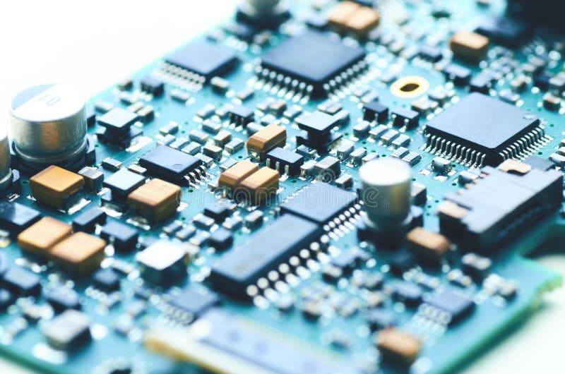 Modern Electronic Board with Microchips and Electronic Parts Stock