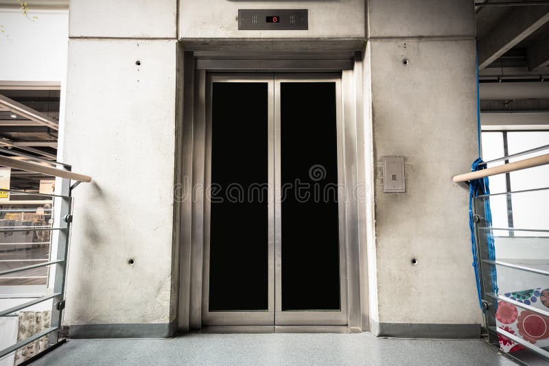 A modern elevator in the store royalty free stock photo