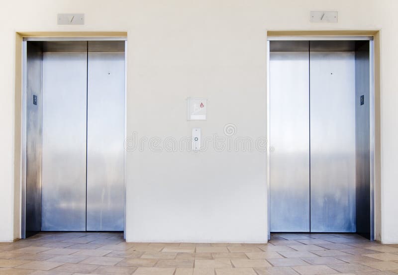 Modern elevators in office building stock photo