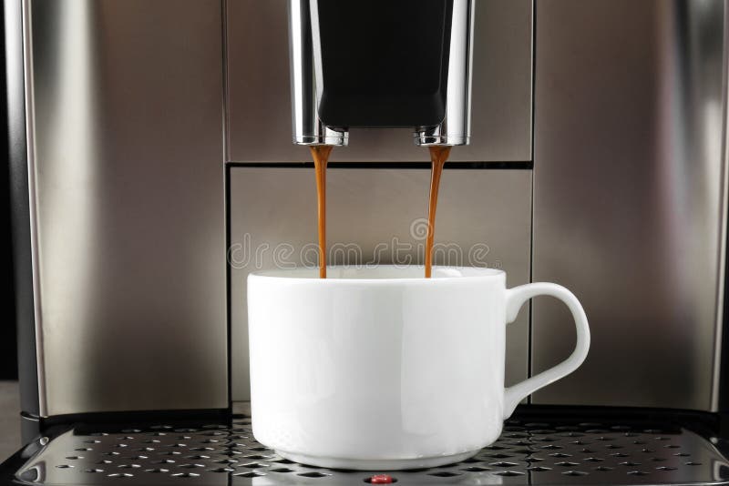 Modern Espresso Machine Pouring Coffee into Cup, Closeup Stock Image
