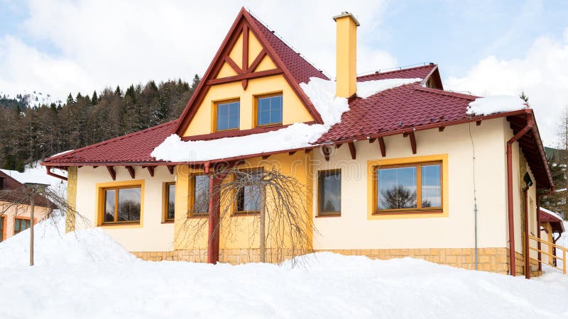 Modern family house covered in snow