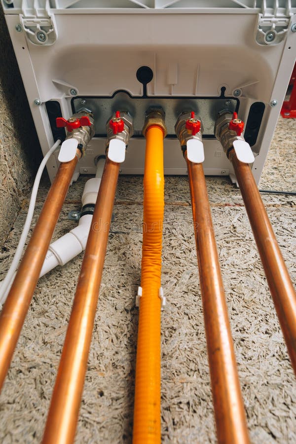 Modern gas boiler bottom piping, independent heating system royalty free stock photography