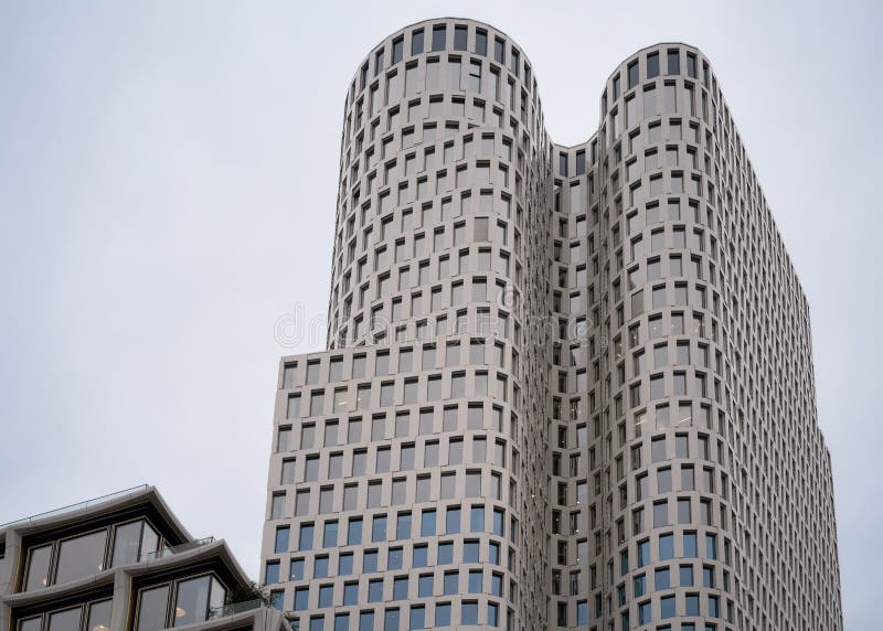 Modern glass skyscraper residential apartment or office architecture Berlin. Modern glass skyscraper as residential apartment house or office building royalty free stock images Modern glass skyscraper residential apartment or office architecture Berlin. Modern glass skyscraper as residential apartment house or office building royalty free stock images