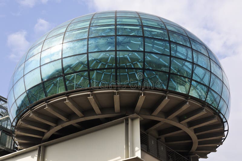 Modern glass sphere over the roof