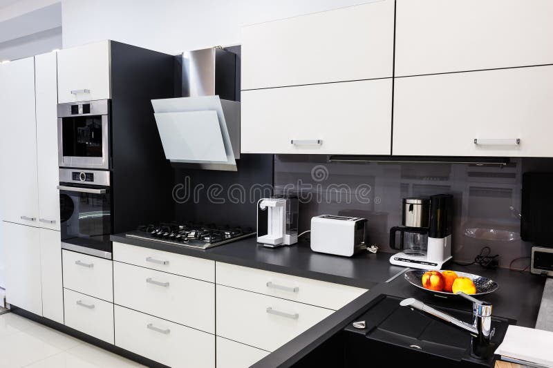 Modern hi-tek kitchen, clean interior design stock images Modern hi-tek kitchen, clean interior design stock images