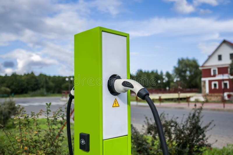 Modern and high technology of transportation electric vehicle charging station with plug of power cable supply for Ev car or stock photography Modern and high technology of transportation electric vehicle charging station with plug of power cable supply for Ev car or stock photography
