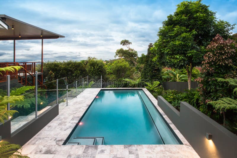 Modern hotel with a pool under bright blue sky royalty free stock image Modern hotel with a pool under bright blue sky royalty free stock image