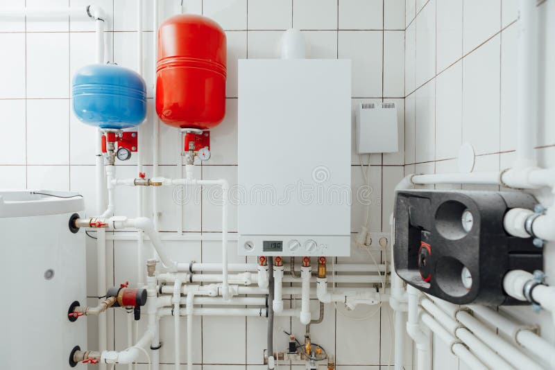 Modern independent heating system in boiler room royalty free stock photos