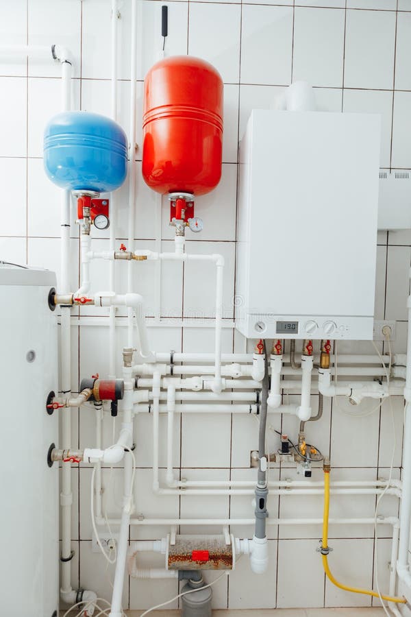 Modern independent heating system in boiler room stock image