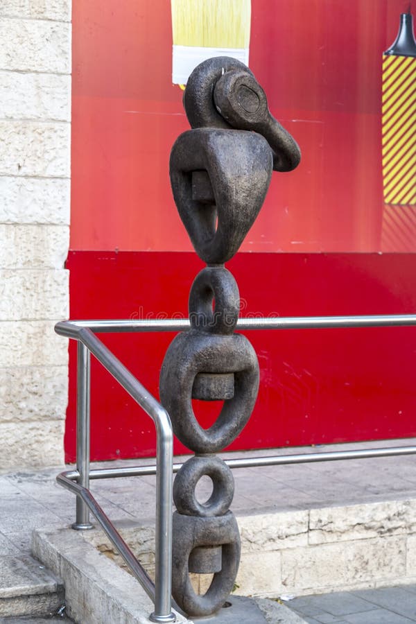 Modern industrial chain shaped metal sculpture in HaDavidka Square, Jerusalem, Israel stock image Modern industrial chain shaped metal sculpture in HaDavidka Square, Jerusalem, Israel stock image