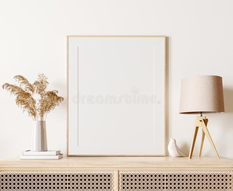 Modern interior design in natural colors with dry plants decoration and empty white mock up picture frame