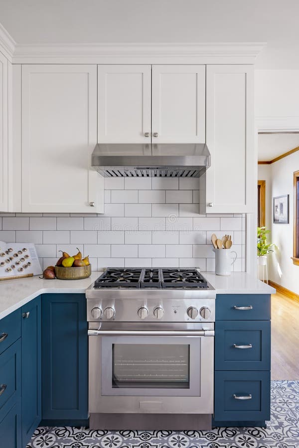 Stove closeup in modern kitchen interior with stainless steel gas cook-top.  Stock Photo