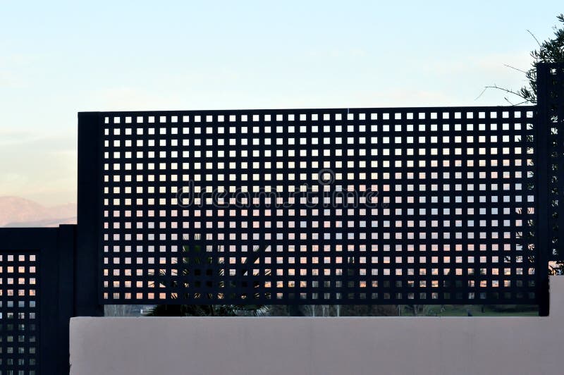 Modern iron fence stock photo. Image of garden, blue 84107106