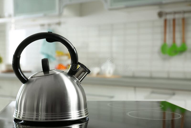 Modern Kettle with Whistle on Stove in Kitchen Stock Photo Image of