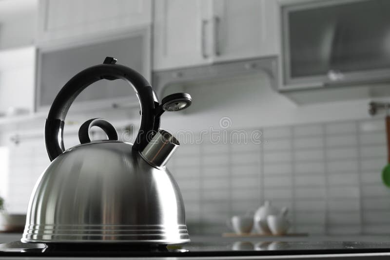 Modern Kettle with Whistle on Stove in Kitchen Stock Photo Image of