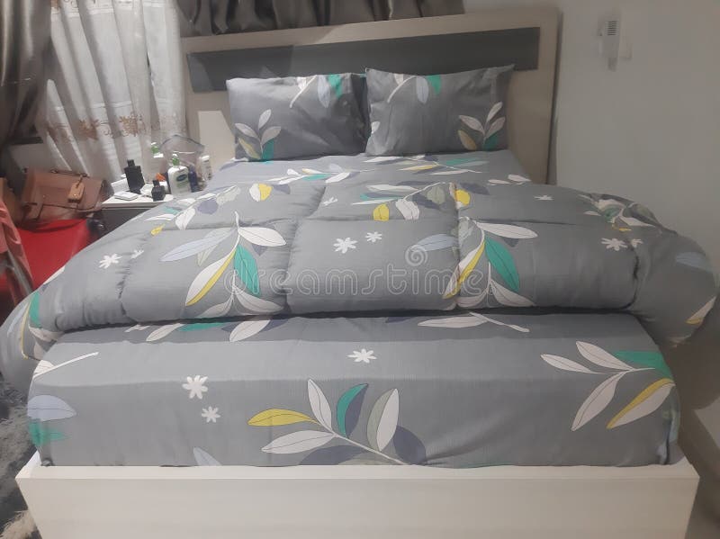 Modern kingsized laid bed stock photo. Image of modern 271161444