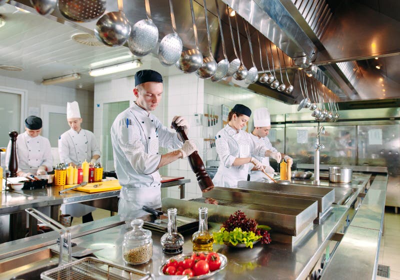 Modern Kitchen. the Chefs Prepare Meals in the Restaurant`s Kitchen