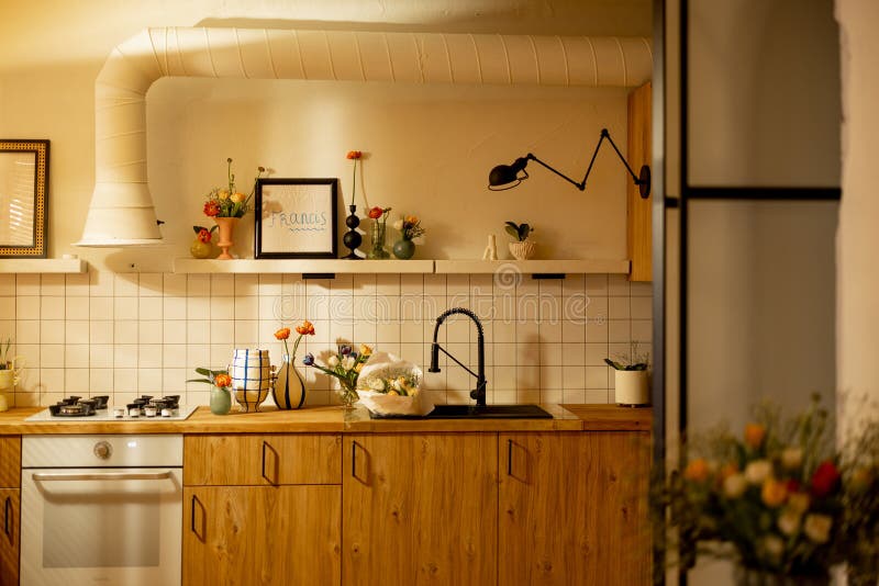 Modern Kitchen Interior Decorated with Flowers Stock Photo - Image ...