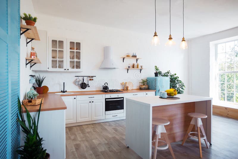 Modern Kitchen Interior with Island, Sink, Cabinets, and Big Window in New Luxury Home. royalty free stock photos Modern Kitchen Interior with Island, Sink, Cabinets, and Big Window in New Luxury Home. royalty free stock photos