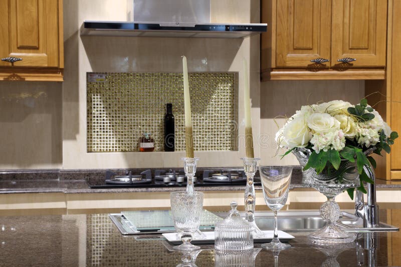 Modern Kitchen Room with Kitchenware and Glass on Table Stock Image