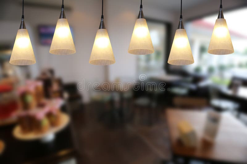 Modern Lamp Hanging from the Ceiling of the Restaurant Stock Image