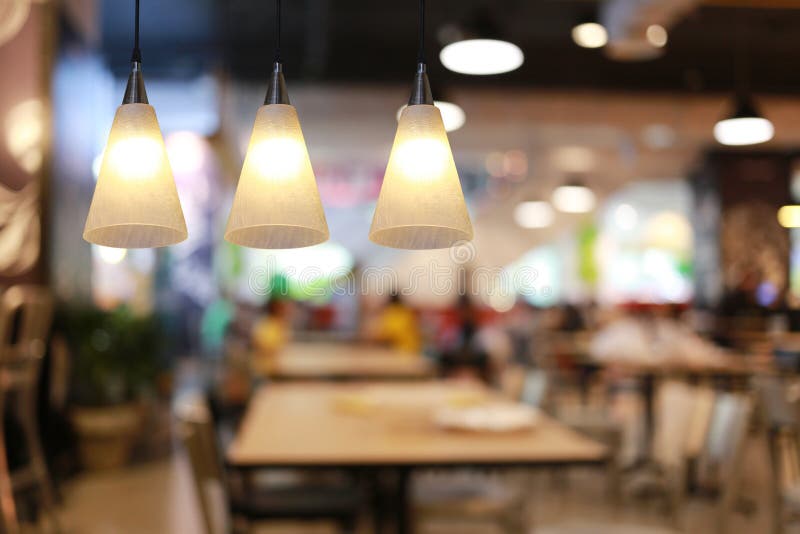 Modern Lamp Hanging from the Ceiling of the Restaurant Stock Image
