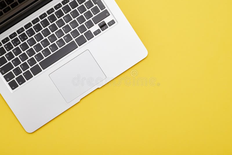 Modern Laptop Keyboard On Yellow Background Stock Photo Image of