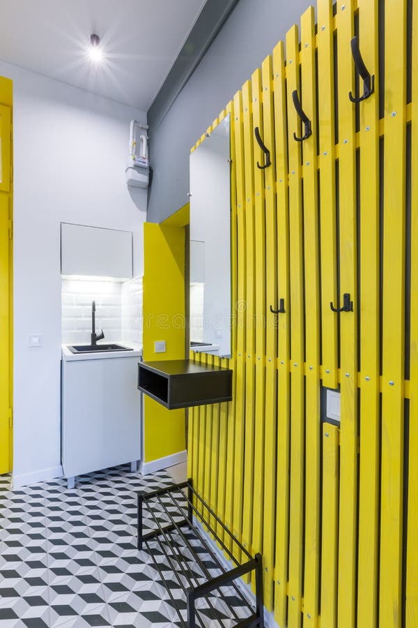 Modern Loft Style Kitchen with Yellow Interior Doors Stock Photo