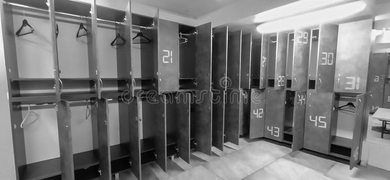 Modern Looking Gym Or Sports Locker Room With Lockers Open
