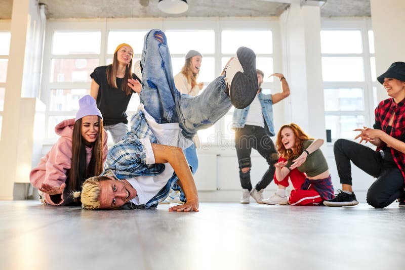 Male Dancer Performing Break Dance or Hiphop in Studio Stock Photo