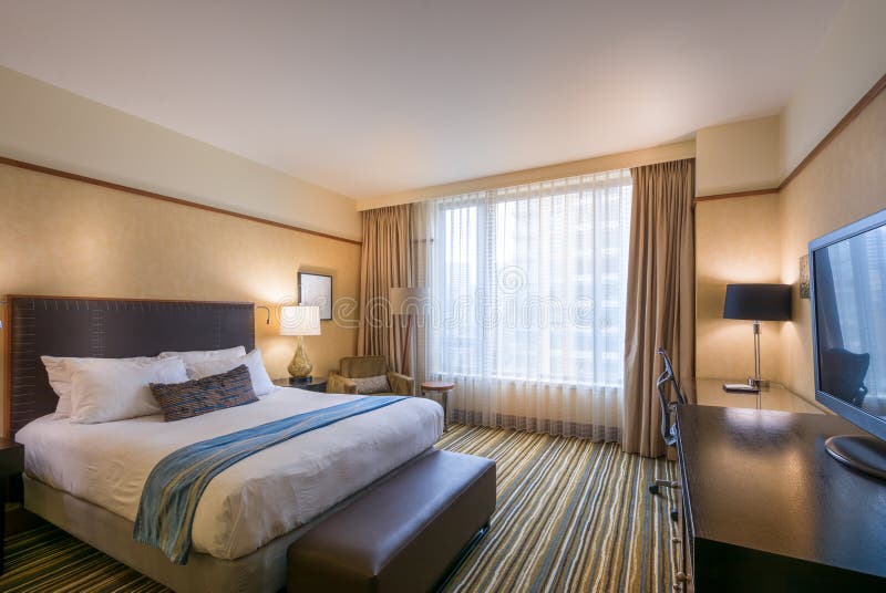 Modern master bedroom in a hotel royalty free stock photos