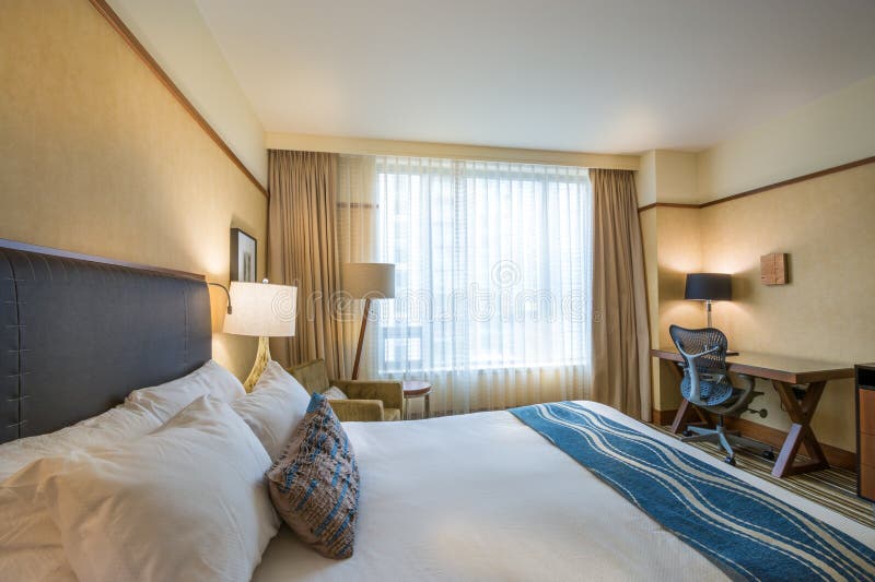 Modern master bedroom in a hotel royalty free stock image