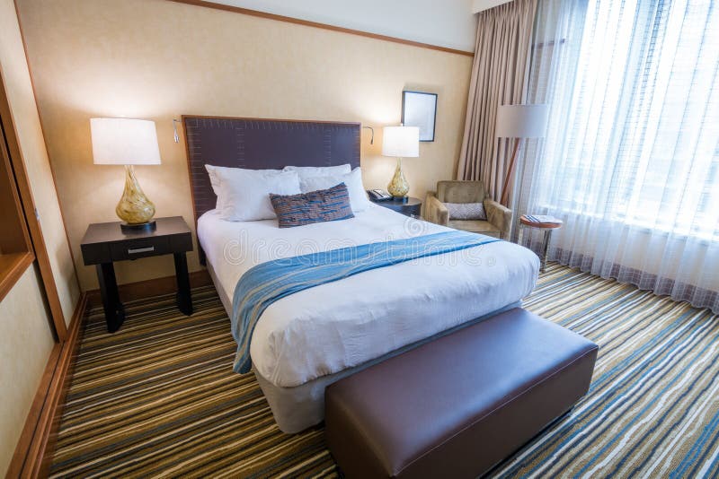 Modern master bedroom in a hotel royalty free stock images