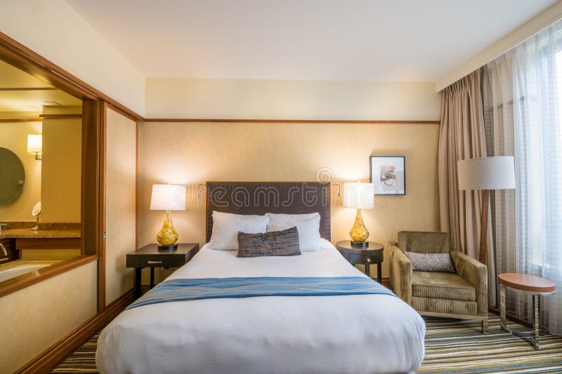 Modern master bedroom in a hotel royalty free stock photos