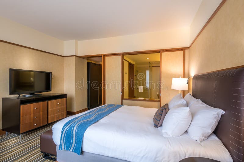 Modern master bedroom in a hotel royalty free stock image