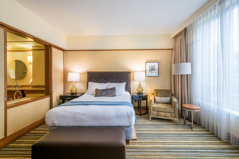 Modern master bedroom in a hotel royalty free stock photos