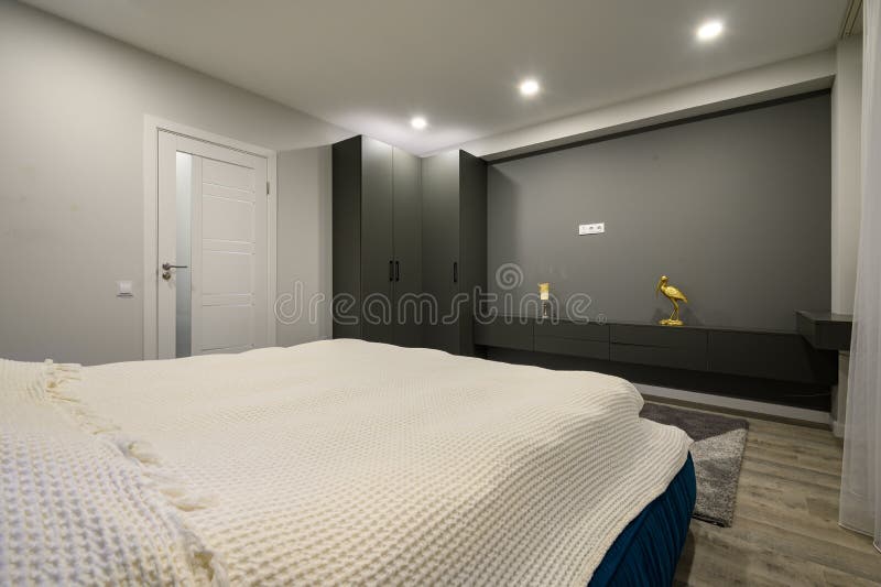 Modern Master Bedroom with Trendy Gray and White Interior Stock Photo Image of house, carpet