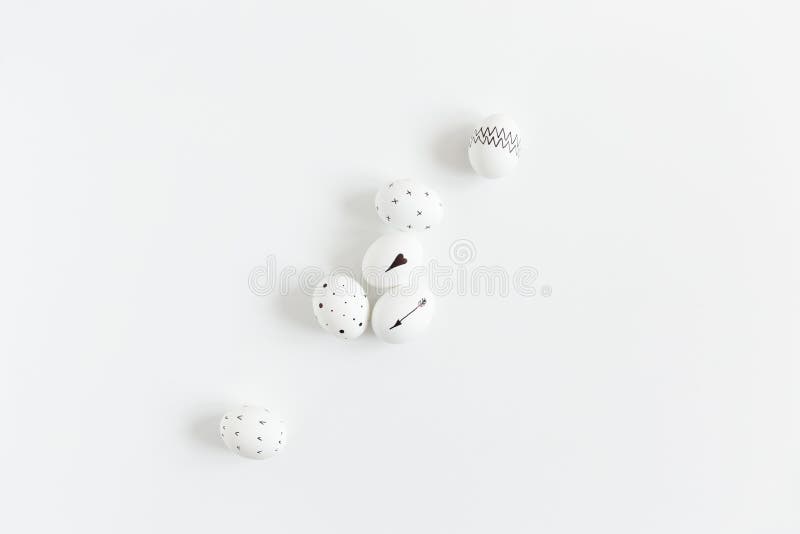 Modern minimal Easter egg. Black and white, trendy flatlay. Simplicity. White background stock photos