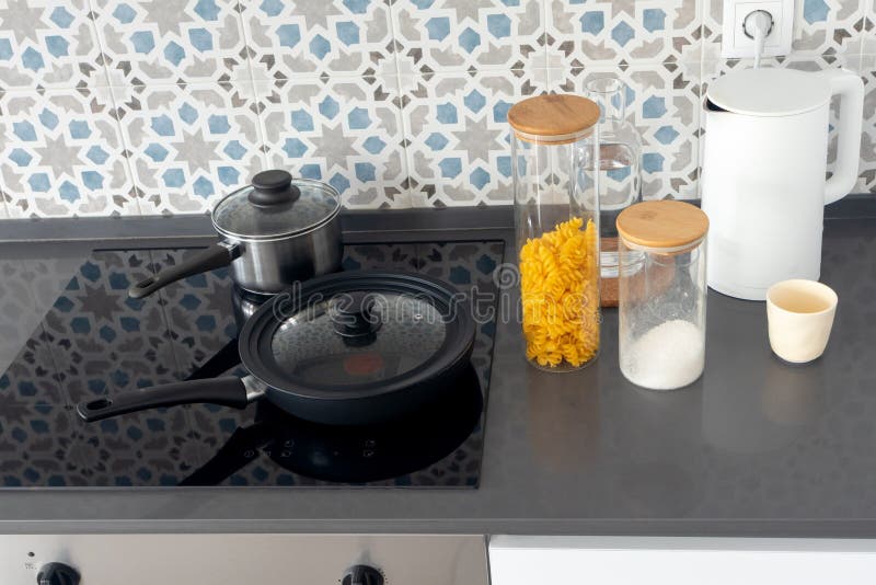 Modern minimalist kitchen with clean black countertop stock image