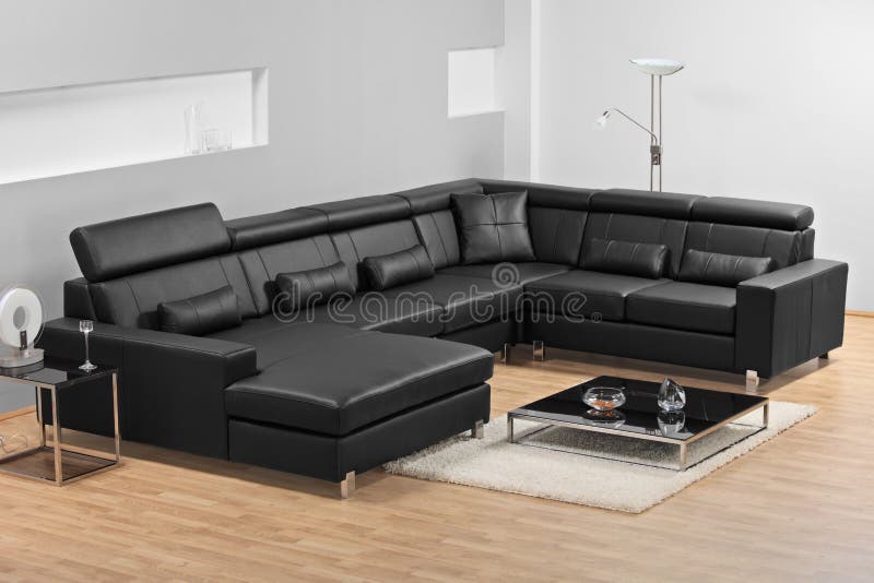 A modern minimalist living-room with leather sofa stock photos