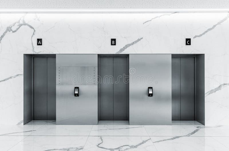 Modern minimalist lobby interior with three steel lift doors stock photo