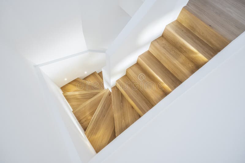 Modern minimalist staircase with wooden steps stock photos
