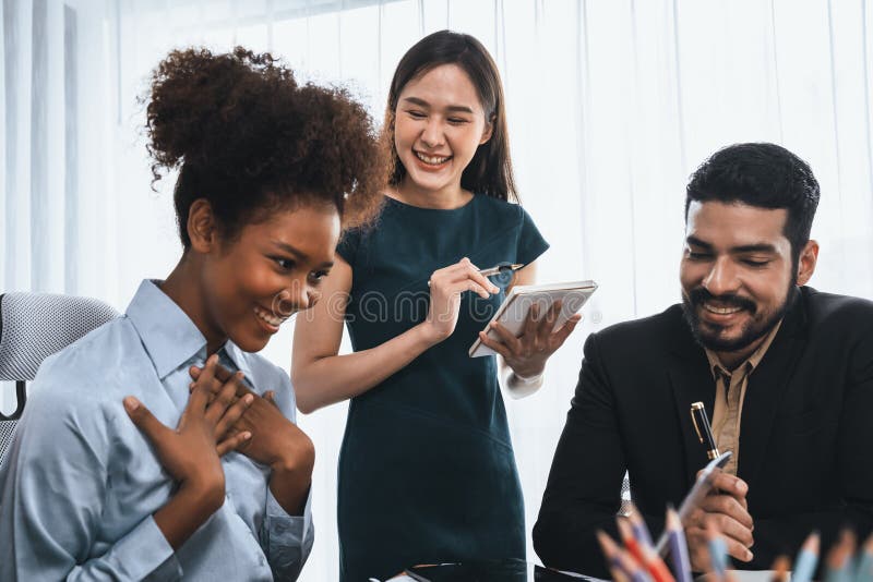 Modern multicultural office worker in corporate workplace. Concord stock photo