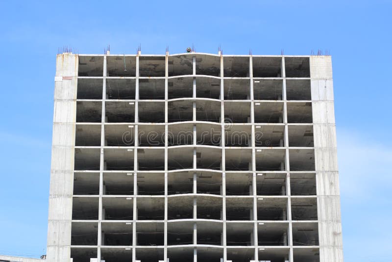 Modern and new apartment building. Photo of a tall block of flats with balconies royalty free stock photo Modern and new apartment building. Photo of a tall block of flats with balconies royalty free stock photo