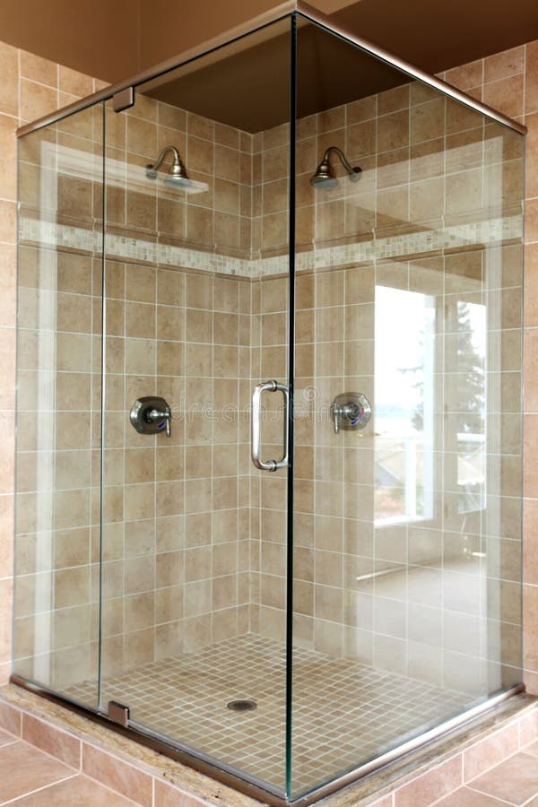 Modern New Glass Walk In Shower With Beige Tiles. Stock Photo - Image