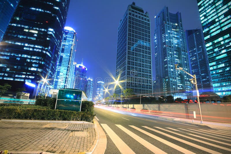 Modern office building background of car night with light trails royalty free stock image Modern office building background of car night with light trails royalty free stock image