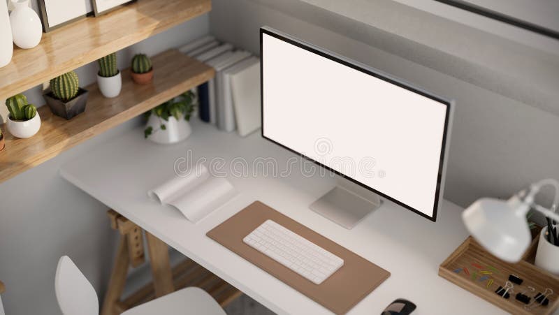 A modern office desk workspace with computer mockup and decor on white table. above view royalty free illustration