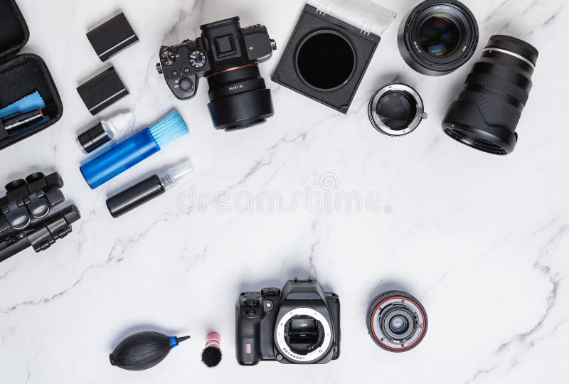 Modern photography cleaning kit workstation on white marble background royalty free stock photography