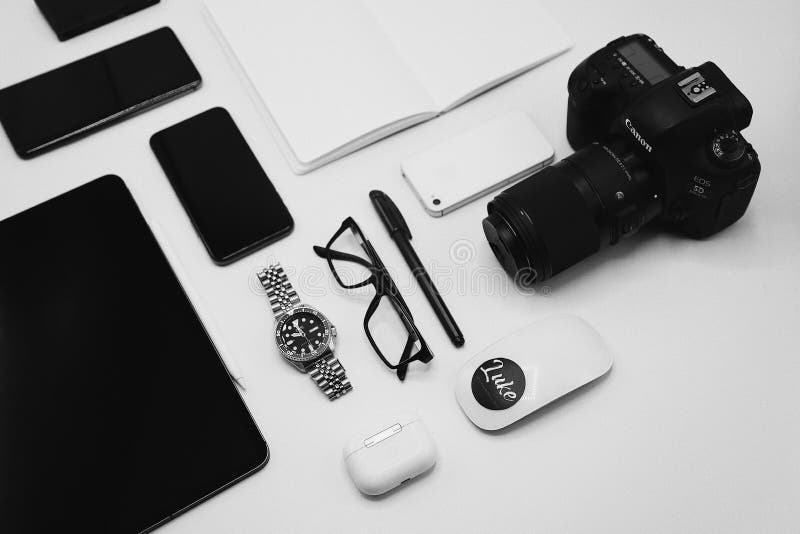 Modern photography equipment over white table background stock photo